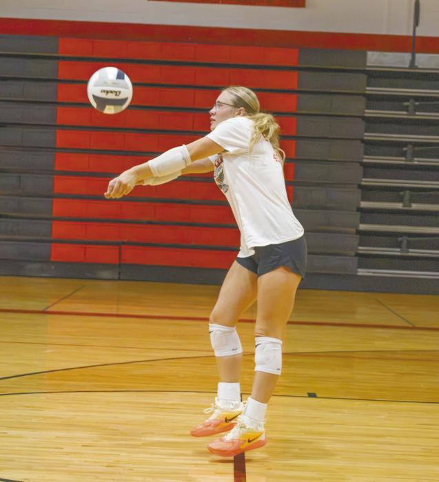 Senior Gracyn Painter receives a serve during the team's sports drink scrimmage on Friday, August 21.