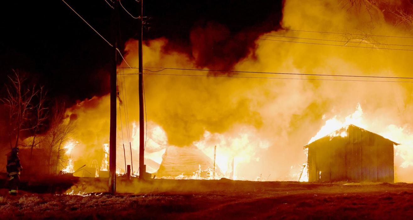 All three structures were completely engulfed in flames when firemen arrived at the scene according to Ainsworth Fire Chief Brad Fiala.