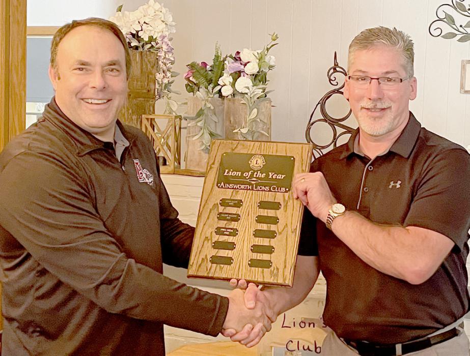 Ainsworth Lions Club President Dale Hafer presented the Lion-of-the-Year plaque to Jim Arens at their September 19th meeting.