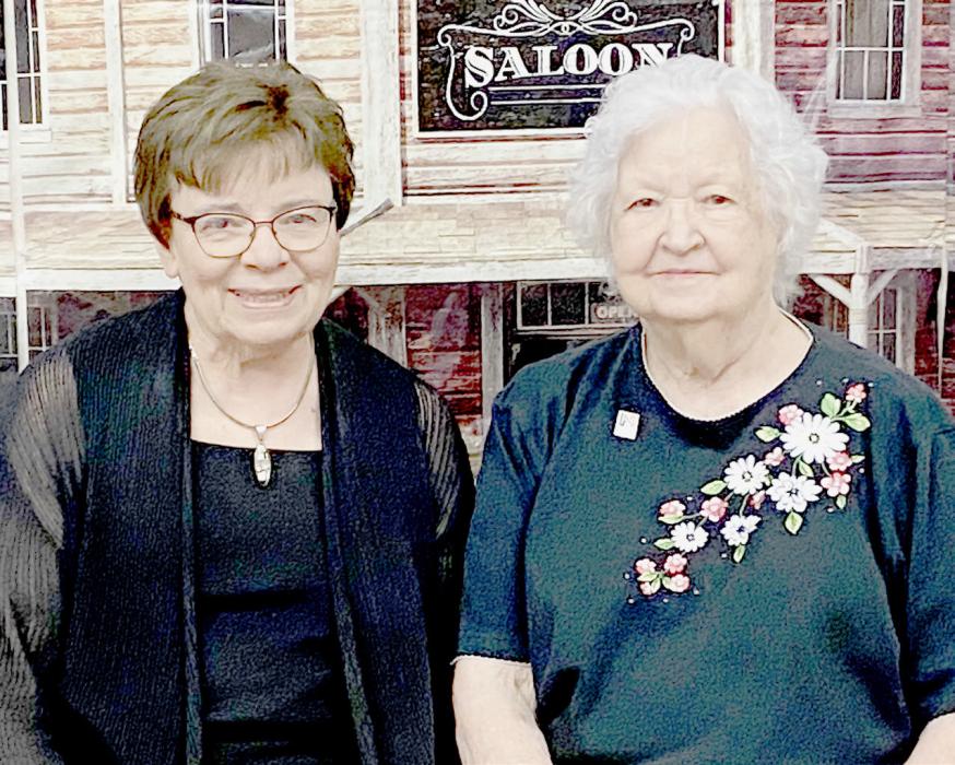 History Nebraska Board member and past president Marilyn Moore (left) from Lincoln presented Wardene Roark the 2023 Heritage Hero Award commemorative pin and certificate on June 17th at The Palace in Long Pine in recognition of her leadership in securing the former Miller – Loehrs Rooming House in Long Pine and converting it to the present-day Heritage House Museum.