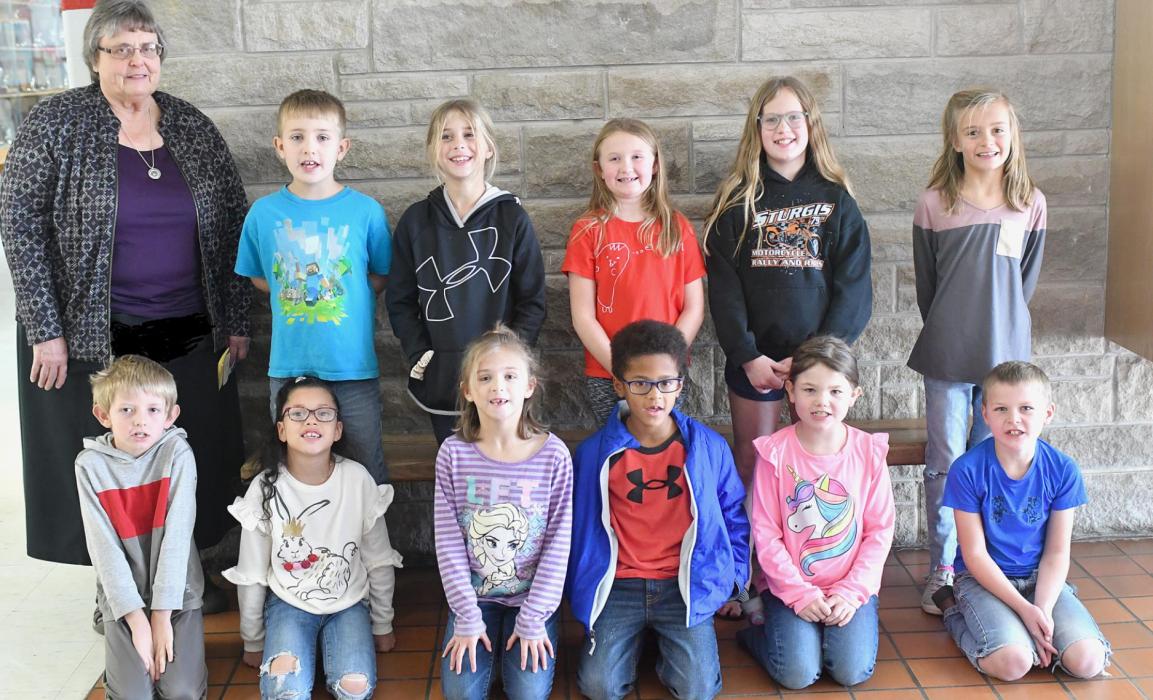 Miss Peterson’s second graders share their thoughts on Fall Time. Her students are (Front Row - Left to Right): Daniel Lewis, Juliette Navarro, Logan Johnson, Myles Fatile, Taylor Kelly and Jerrod Buechle; (Back Row - Left to Right): Miss Peterson, Ty Ruhter, MaKayla Keller, Sophia Schroedl, Faith Haley and Elsie Graff. Not present were Jon Cannaday, Jr. and MacKynzi Swett.
