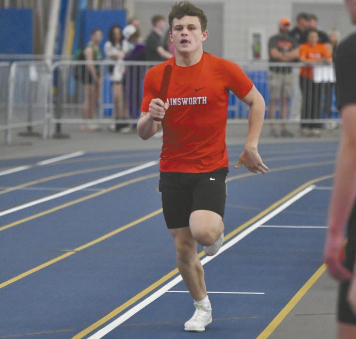 Sophomore Zaine Evans runs in the Boys 4x400 meter relay. The relay team placed fifth at the UNK Meet.
