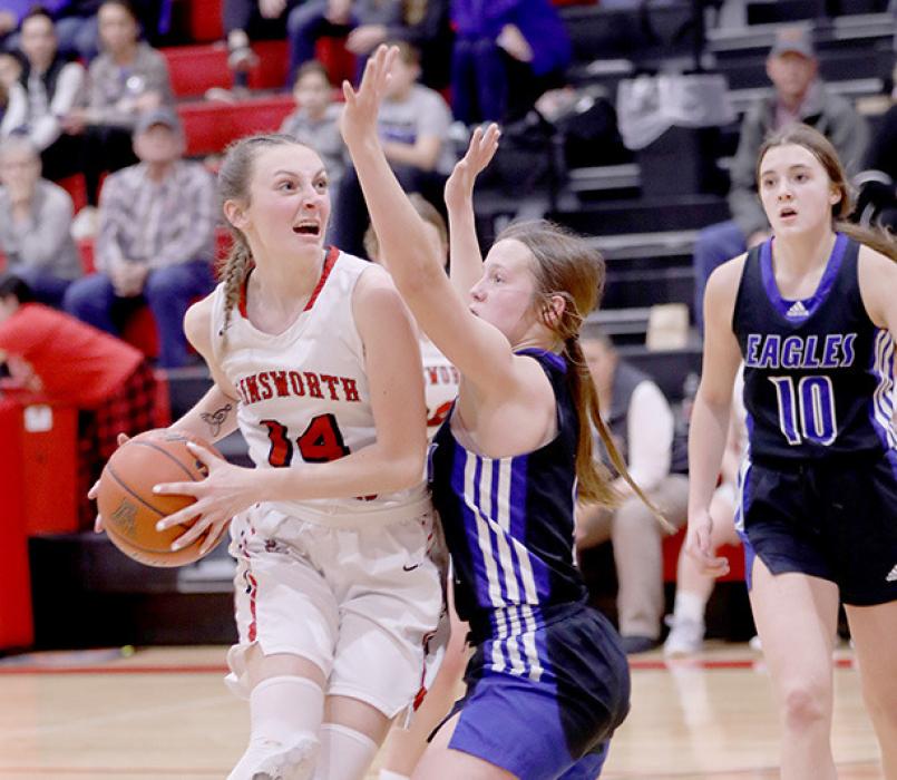 Cameryn Goochey looks for the basket against the O’Neill Lady Eagles.