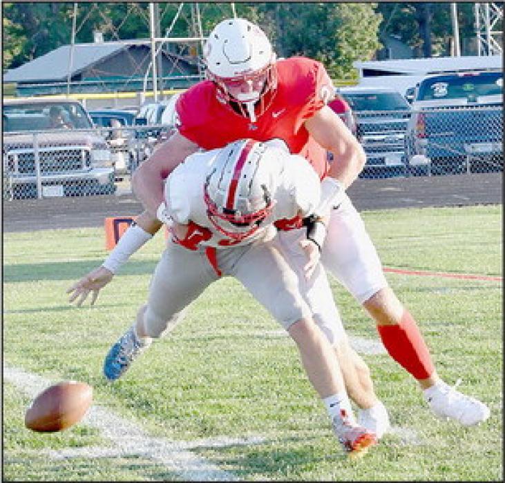 Carter Nelson got to the Madison quarterback causing a fumble that was recovered by Aiden Jackman.
