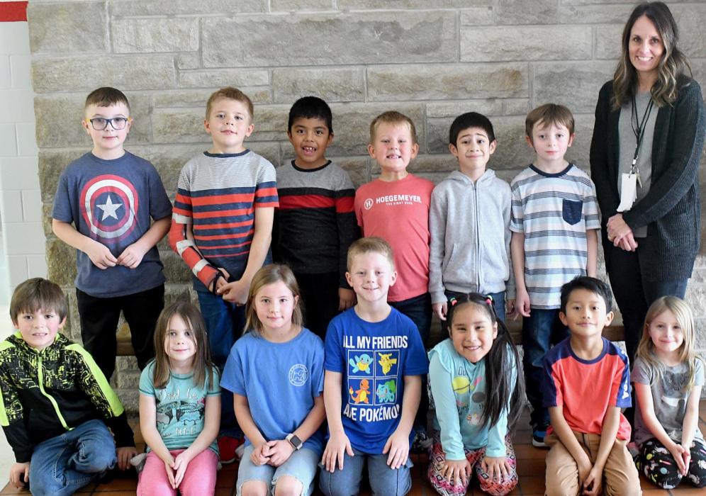 How to make a pumpkin pie was described by these first grade students of Mrs. Alberts. Her students are (Front Row - Left to Right): Lathan Palmer, Rowan Alberts, Sophia Ortner, Landon Arens, Lorena Herberth Perez, Luis Munoz and Sky Holloway; (Back Row - Left to Right): Easton Lammers, Clayton Ferris, Carlos Jimenez, Calin Goochey, Abraham Jimenez, Dylan Johnson and Mrs. Alberts. Not present is Iris Lentz.