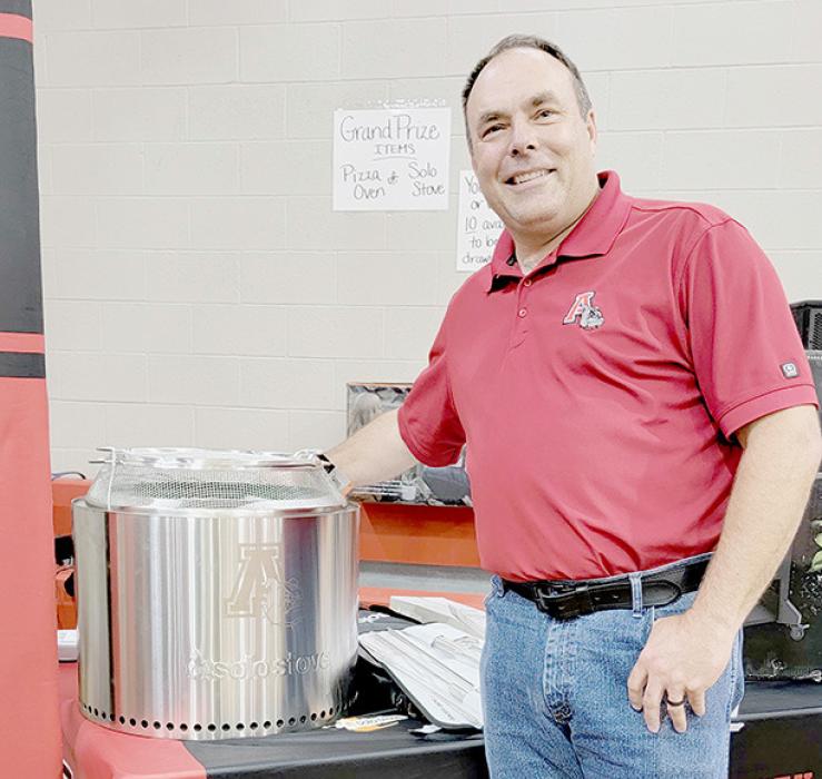 Dr. McKenzie Owen Brodbeck was the second place winner and received a Solo stove. She said they already own one so she donated it back to be auctioned off. Dale Hafer then purchased the Solo stove.