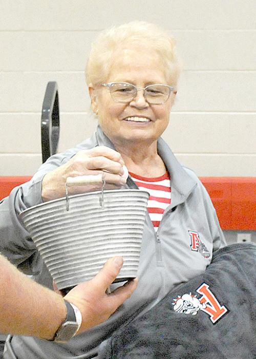 This year, those in attendance at the fundraiser, were able to vote for the 2022-2023 Ainsworth Bulldog “Fan of the Year”. This person supports athletes, coaches and the school, attends sporting events, shows school spirit and encourages good sportsmanship. Bonnie Finley received the most votes, and was given a warm blanket with the Ainsworth Bulldog logo on it.