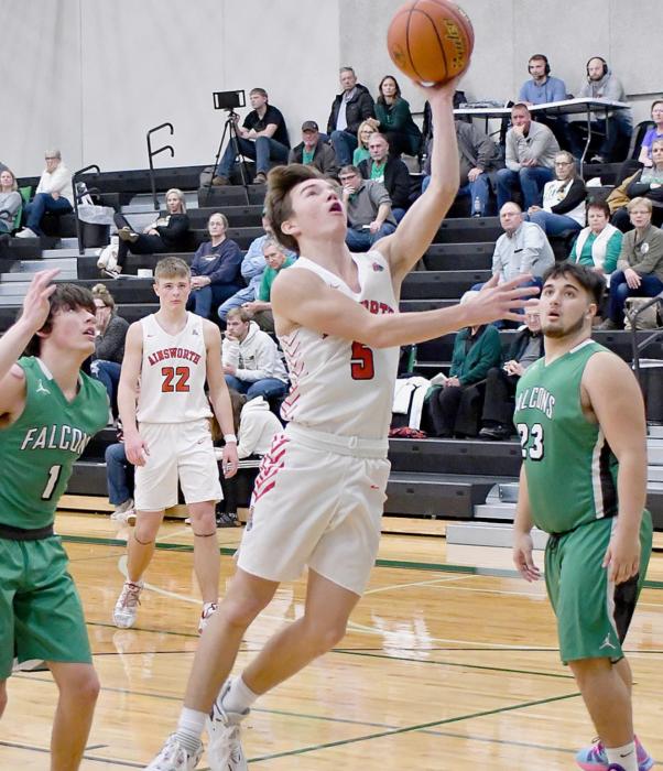 Treagan McNally went in for a lay up against Elkhorn Valley. McNally had 19 points against Elkhorn Valley including the winning three-point shot with just seconds left in the game.