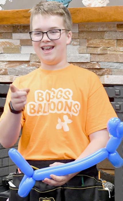 Local Kids Enjoy Boggs Balloon Twisting Show at Ainsworth Library