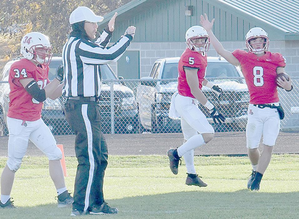 Traegan McNally (8) scored Ainsworth’s first touchdown on a pass interception in the first quarter.