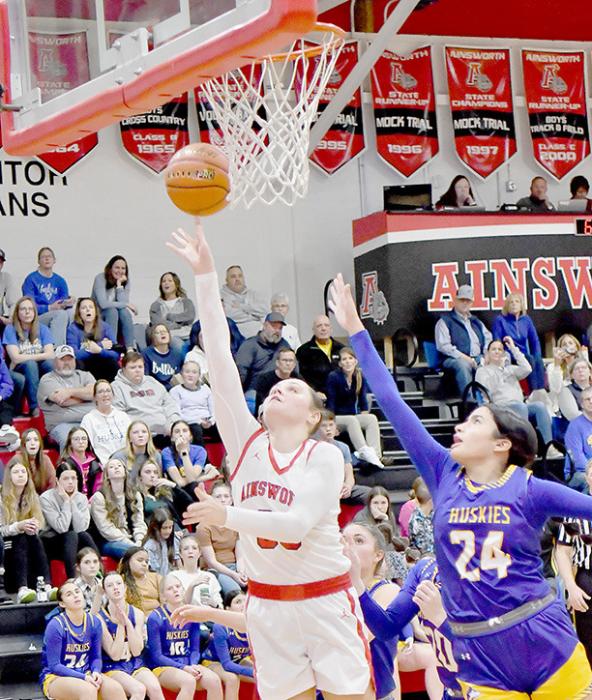 Karli Kral scores a basket in the first half against the West Holt Lady Huskies. Kral had 13 points and 5 rebounds against the Lady Huskies.