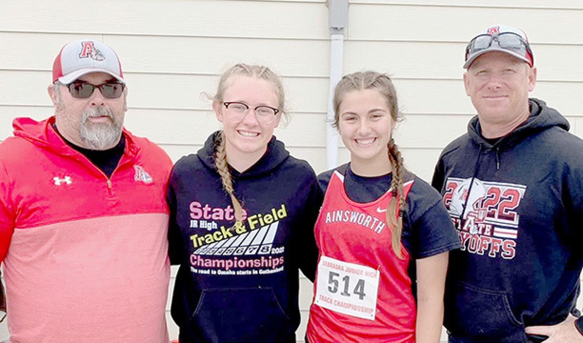 Gracyn Painter and Willa Flynn competed in the 2023 Nebraska Middle School Championship Meet in Gothenburg. Pictured (left to right) are Assistant Coach Clint Painter, Gracyn Painter, Willa Flynn and Head Coach Wade Alberts.