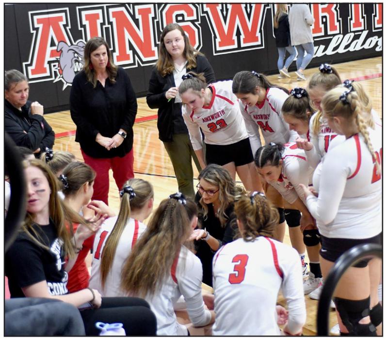 The Bulldogs take a time out and listen to a pep talk from Coach Jeri Graff during their game against the Valentine Badgers, round one of the C1-11 Subdistrict tournament held at Ainsworth. Coaches assisting this year were (left to right): Sandi Nelson, Sarah Schipporeit and Hailey McBride.