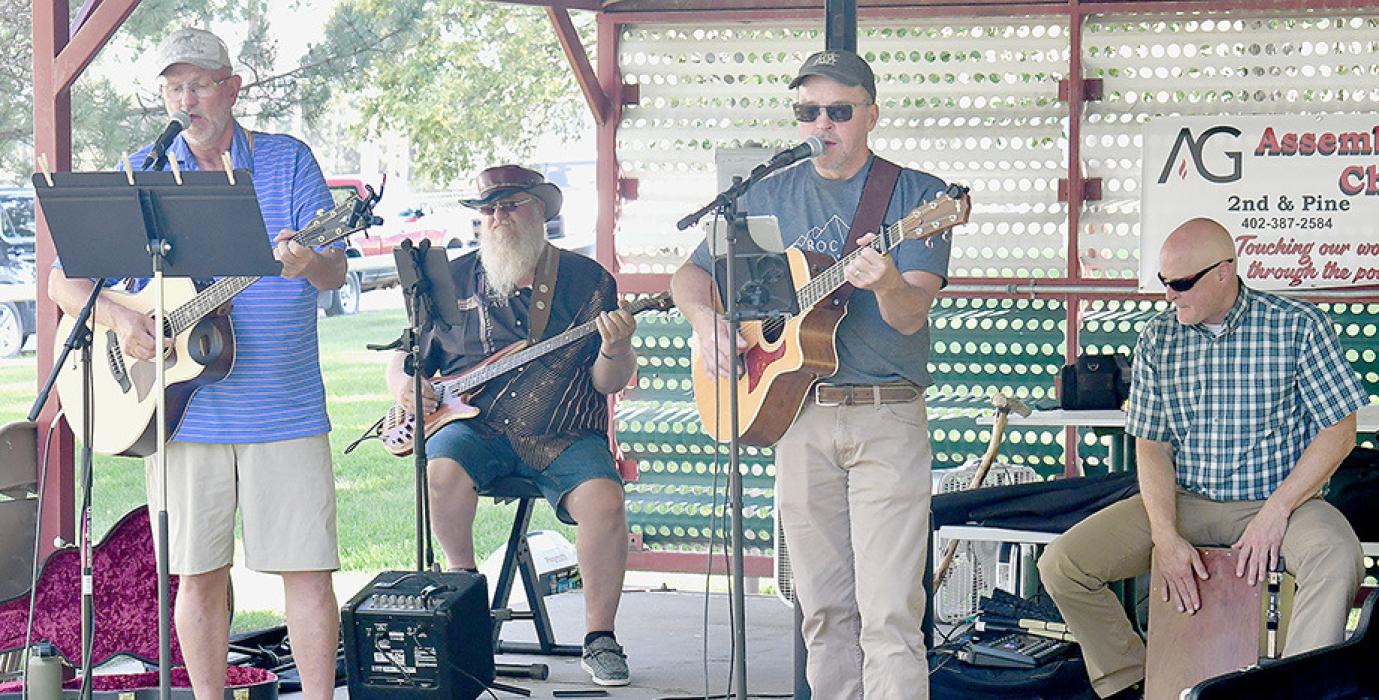 Along with food, there was live music at the Community Picnic. One of the groups providing music were (Left to Right) Randy Anderson, Mike Sybrant, Joel Barrow and Tom Theis. Danny and Kathy Bennett also performed for the crowd.