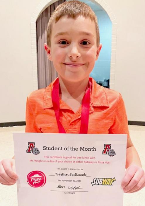 Third grader Tristan Sedlacek (right) was selected as the November Student of the Month.