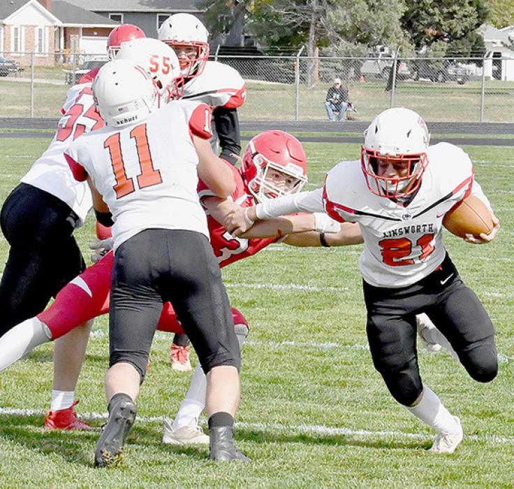 Riggin Blumenstock, #11, made a good block on an O’Neill defender and enabled Morgan Kinney to get the outside and pick up some good yardage.