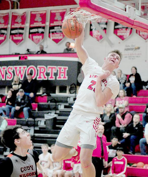 Carter Nelson gets a dunk against Cody-Kilgore. Nelson scored 13 points in the game.