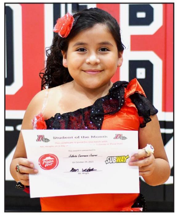Third grader Julieta Carranza Juarez (right) was selected as the October Student of the Month at McAndrew Elementary.