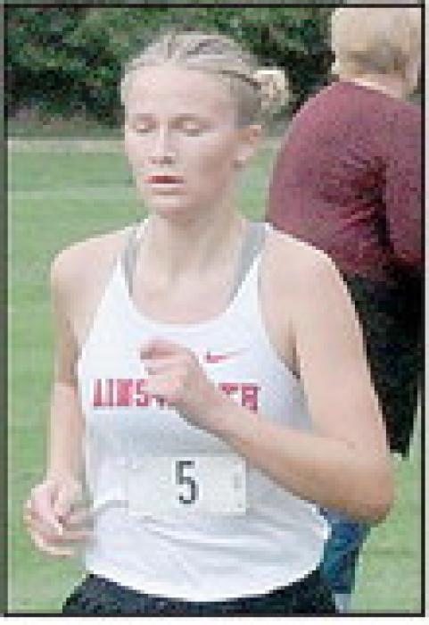 Emma Kennedy placed third with a time of 21:16.37.