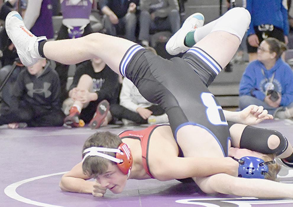 Kaden Evans defeated Chris Hock of Bertrand by a 10-6 decision in the 126 lb. weight class.