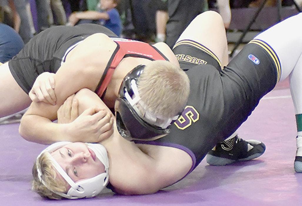 Mason Painter won by 15-0 technical fall over Heath Henson of Sumner-Eddyville-Miller at the Burwell Invitational in the 144 lb. weight class.