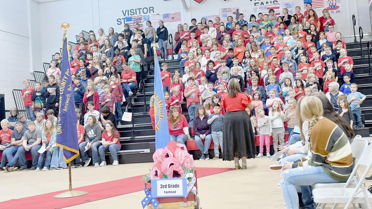 K-6 students under the direction of Kayla Nilson and Erin Rathe sang “America, Of Thee I Sing”. Kindergarten students led the crowd in saying the Pledge of Allegiance.