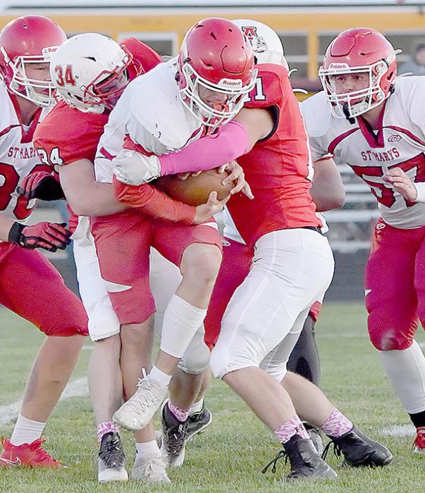 Jacob Held and Riggin Blumenstock combined for a stop on St. Mary’s quarterback. Held led the Dawgs defense with 11 tackles.