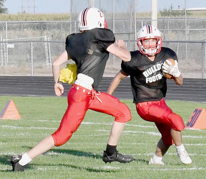 The football team took turns on offense and defense to show spectators what the potential is for the 2022 season.