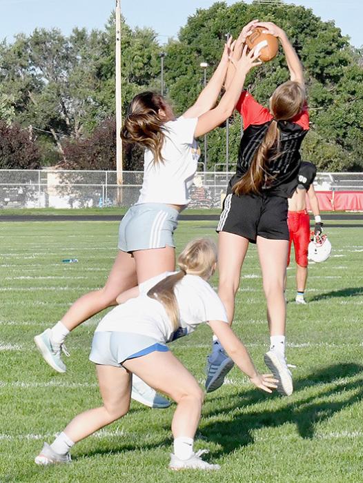 Jolyn Pozehl intercepted a pass during the volleyball players football scrimmage.