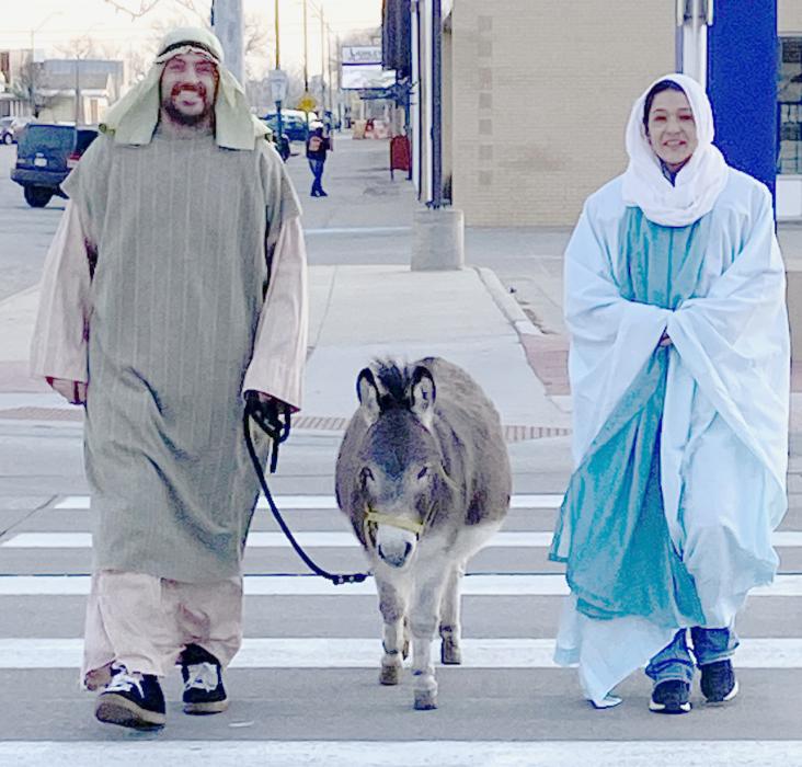 Prior to the performance of the Live Nativity, Cory (Joseph) and Madonna (Mary) Coutts and Rascal walked around town to remind those who saw them the true meaning of Christmas. During the Live Nativity, Braxton (Joseph) Jefferies and Savanna (Mary) Ost portrayed the Holy Family