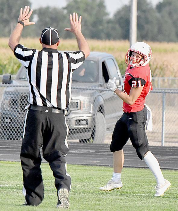 Morgan Kinney smiles as the referee give the touchdown signal following Kinney’s 63 yard touchdown run. Later in the game, Kinney had a 33 yard touchdown run.