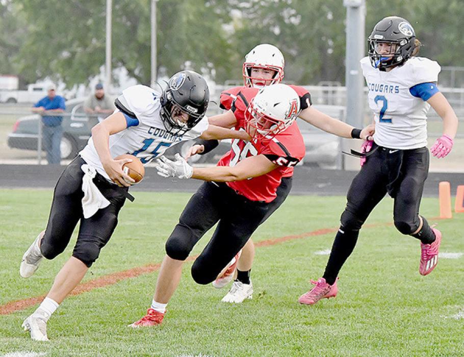 Trey Appelt got to the Cougars quarterback Cash Wickersham. Wickersham got the pass off before the tackle, but was called for intentional grounding.
