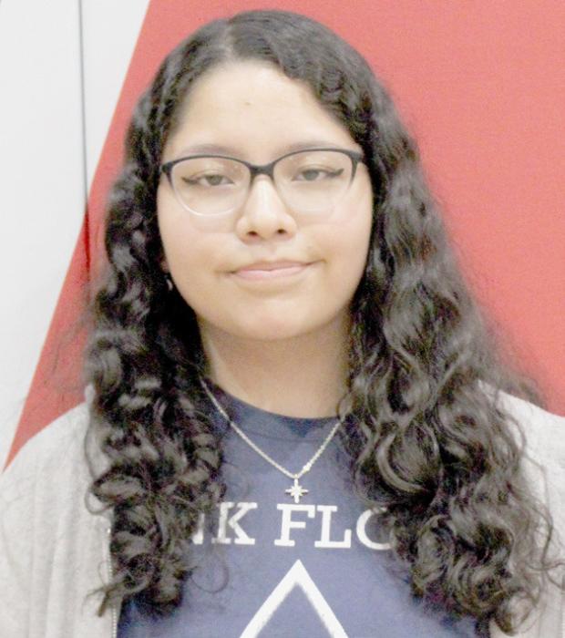 June Iturbide had the winning essay in the social studies class. Her essay was read by Mercedes Little Elk.