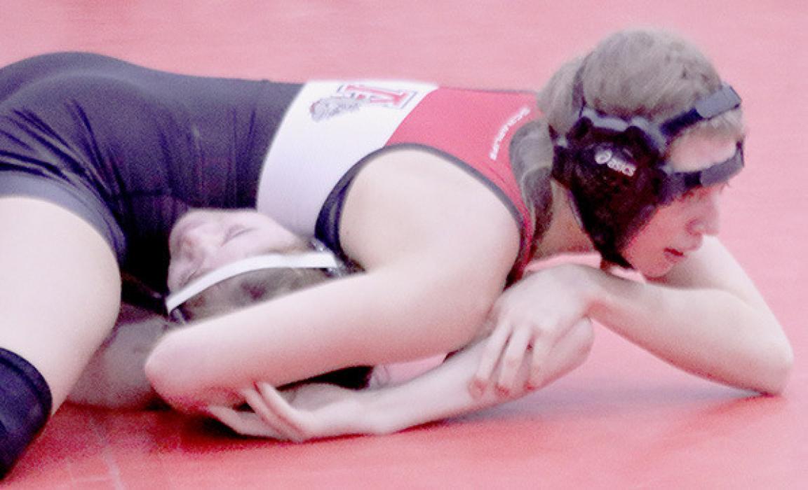 Kaitlyn Sease pinned Ebony Owens of SEM in just 48 seconds at the Amherst Invitational.