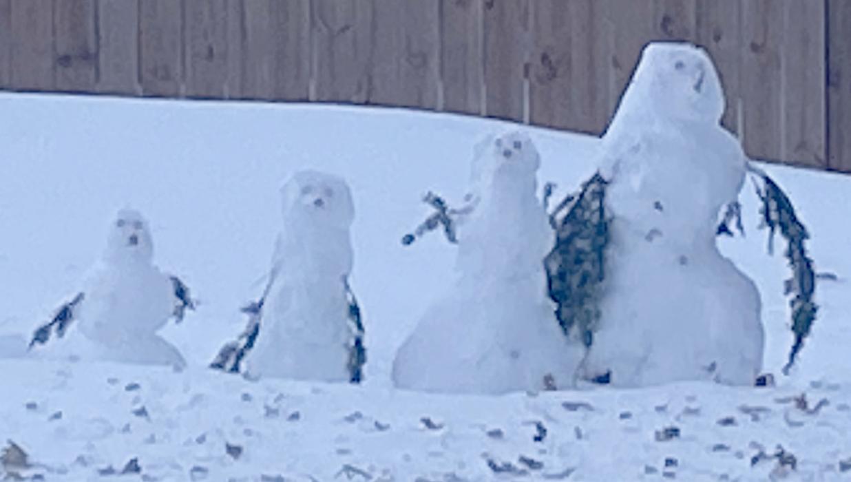 With classes at Ainsworth Community Schools cancelled during the storm, youngsters that would normally have been in school has time to build a snow family.