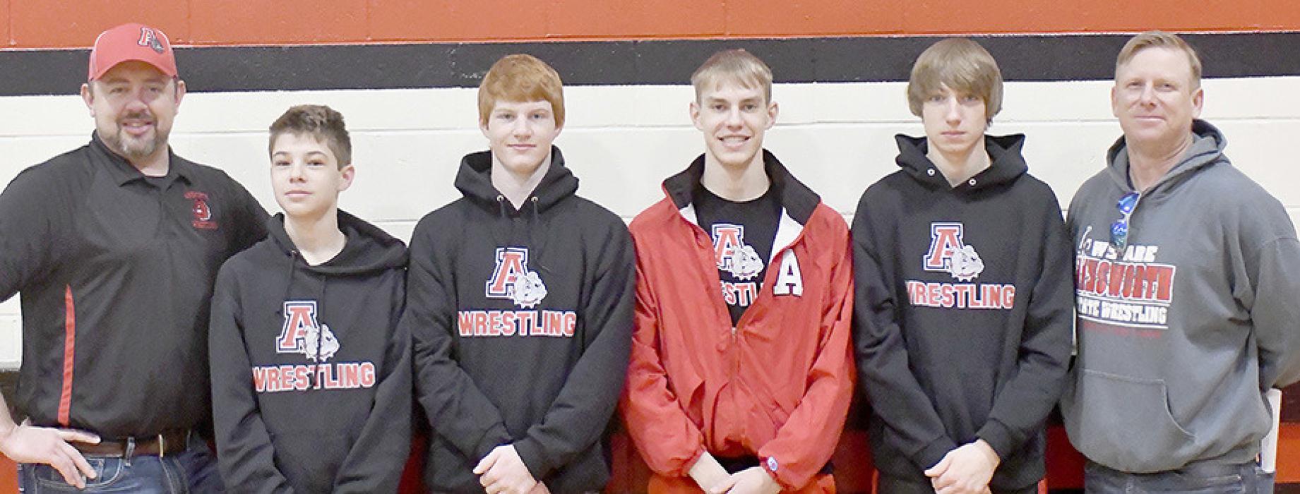 The Ainsworth Boys Wrestling Team completed their 2024 season at Districts in Weeping Water. Team members competing were (Left to Rigt) Head Coach Jake Graff, Holden Beel, Sam Titus, Aiden Jackman, Jackson Irwin and Assistant Coach Wade Alberts.