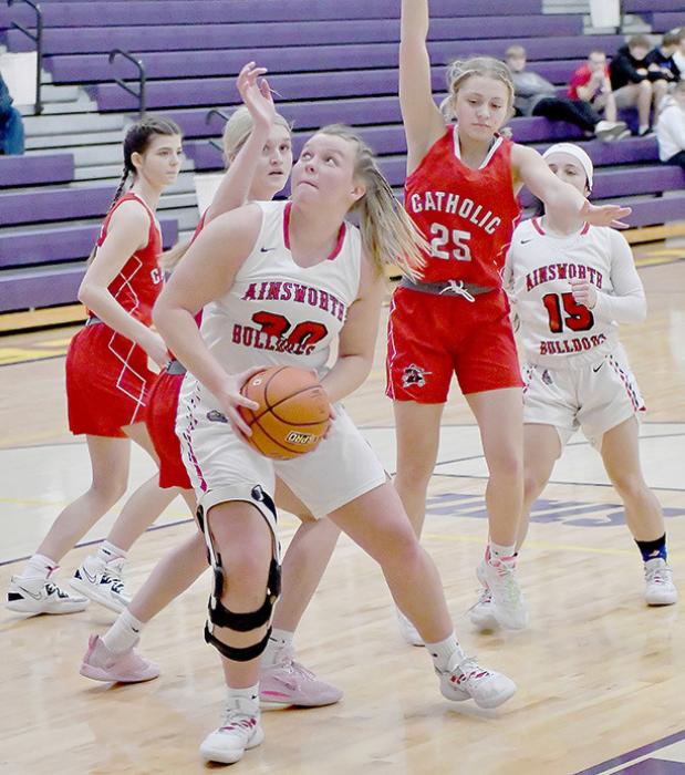 Jocelyn Good looks for the basket in the first quarter against Norfolk Catholic.
