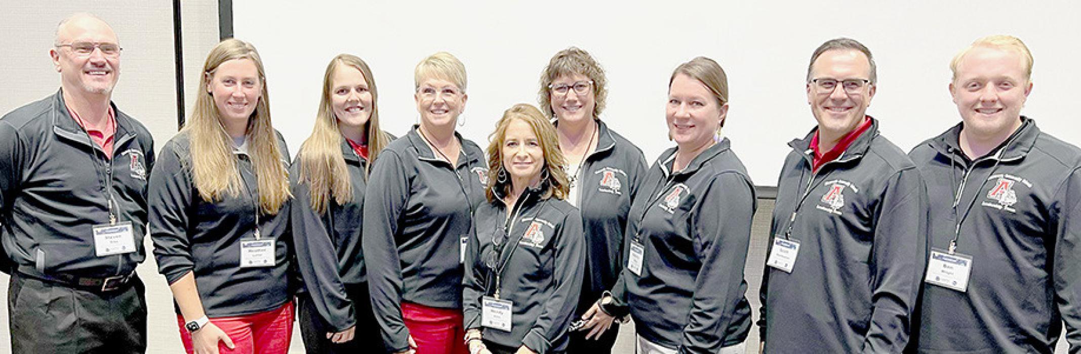 Attending the MTSS Summit in Kearney were Ainsworth staff (Left to Right) Mr. Dike, Miss Lutter, Mrs. Reisen, Mrs. Micheel, Mrs. Allen, Mrs. Ganser, Mrs. Denny, Mr. Steinhauser and Mr. Wright.