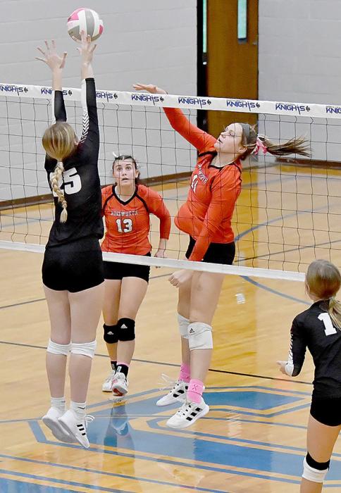 Karli Kral goes over the out stretched arms of a Stuart Bronco defender. Both sets against the Broncos went over 25 points to win.