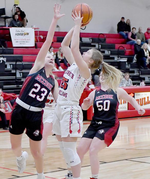 Saylen Young puts up two points against McCook in Ainsworth’s opening game of the SWC Tournament.