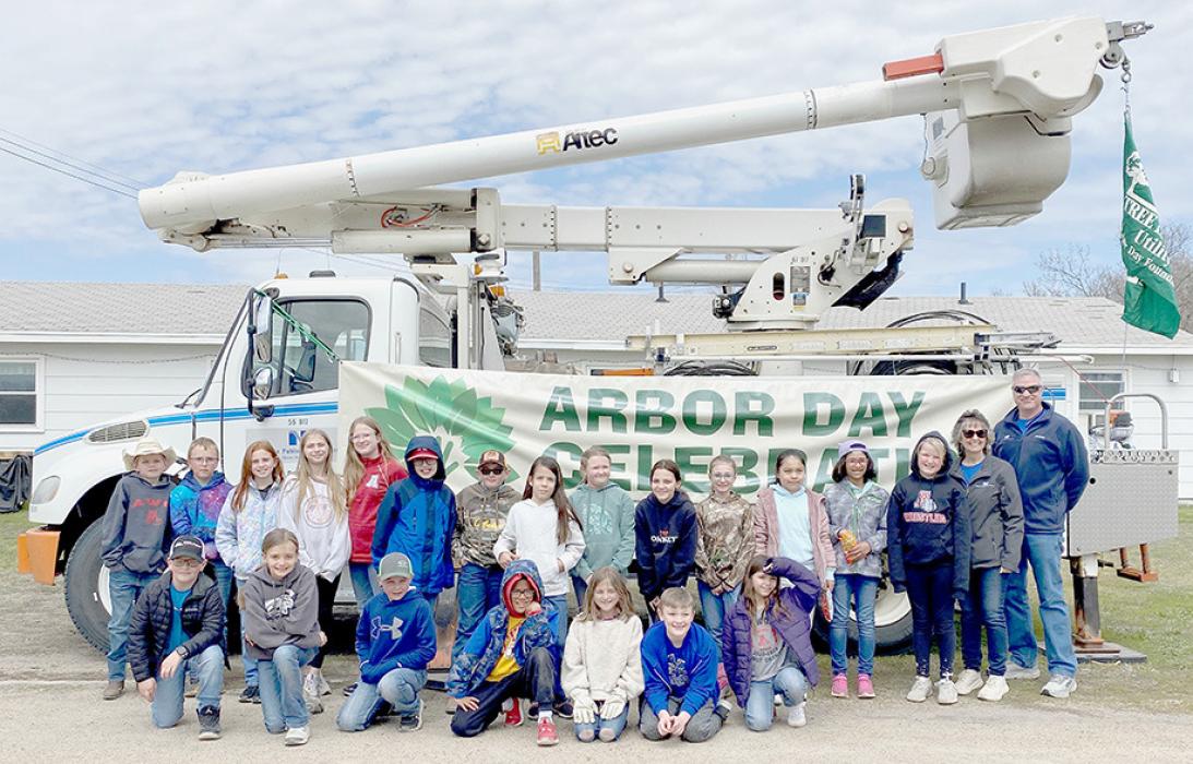 Fourth grade students from Ainsworth Elementary (pictured above) and Bassett Grade School worked with NPPD employees to plant 10 trees along the Cowboy Trail in Long Pine on Wednesday, April 24th in honor of Arbor Day.