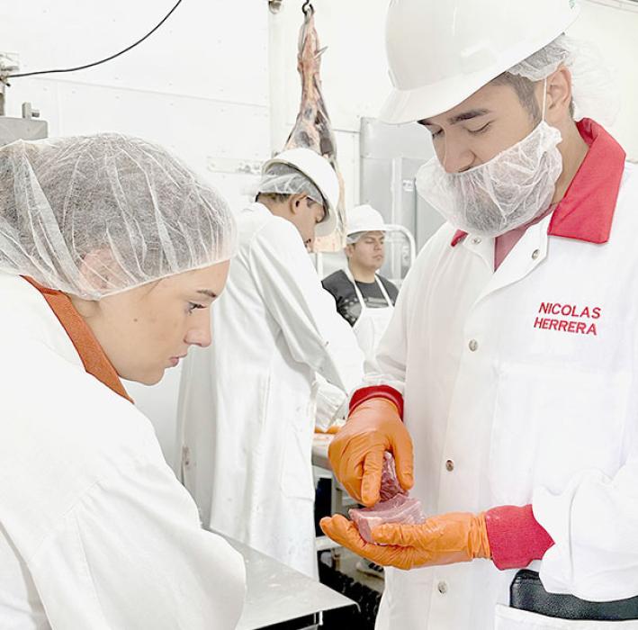Nicolas Herrera, University of Nebraska - Lincoln, explained carcass evaluation to the group.