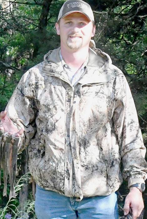 On June 4th, this Pine Valley Resort guest was about to throw his breakfast on the fire, which consisted of fish he caught in the creek a short walk from his cabin.