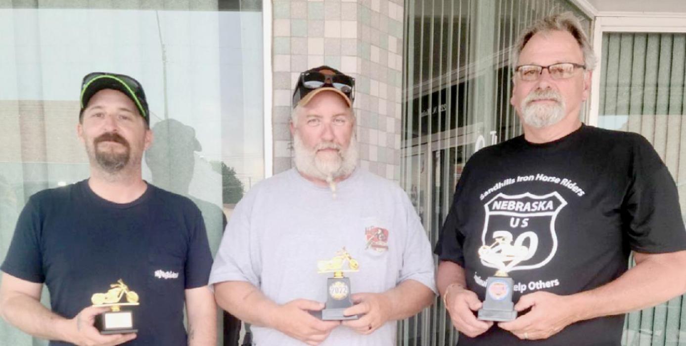 Winners in the motorcycle competition during the Alumni Car and Motorcycle Show went to (left to right): 3rd place, Chad Lauer with his 2016 ZX14R Kawasaki, 2nd place to Chris Osterman showing his 2017 Harley Street Glide and 1st place winner was Corvin Hinrichs with his 2022 Indian.