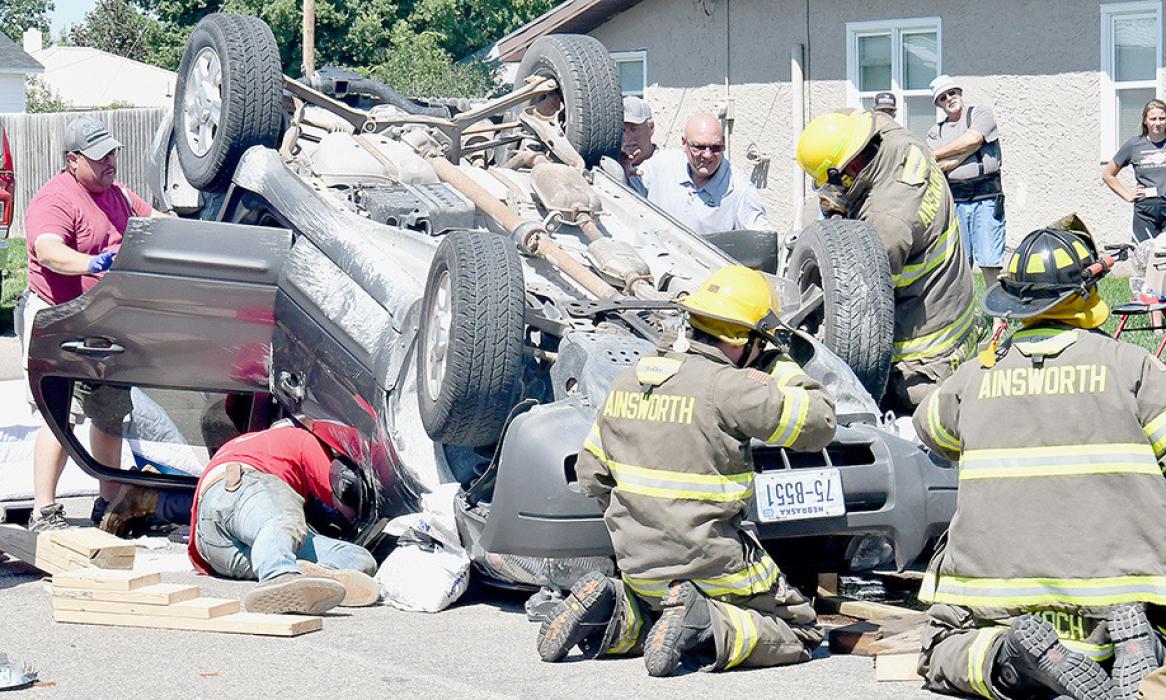 Ainsworth Fire and Rescue Extract Two from Vehicle Rollover