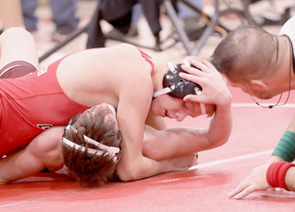 Mason Painter pinned Carson Reiman of Gothenburg in his first match in the 132-JV lb. weight class. Painter went on to take second place in his weight class.