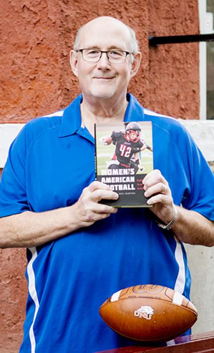 Ohio Northern University History Professor Russ Crawford writes book about women athletes who are breaking barriers on the gridiron. Crawford is a 1980 graduate of Ainsworth High School. Photo by Rae Staton, ONU Staff Photographer