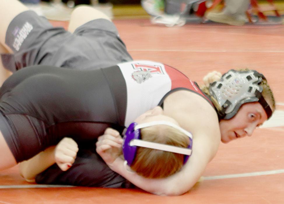 Tatum Nickless pinned Elli Bock of Minden in :37 in the Consolation Round 2 in the 110 lb. weight class.