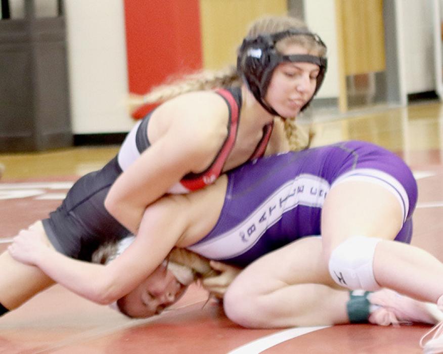 Kaitlyn Sease, 125 lb. weight class, won by a fall in 1:33 over Ruby Knull of Battle Creek.