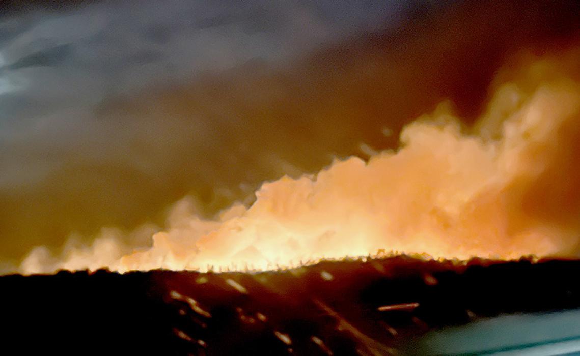 Area fire departments were called to provide mutual aid for the Halsey Forest fire and grass fire north of Highway 2. This picture was taken from Highway 2 looking south to the Halsey Forest. Photo by Ann Fiala